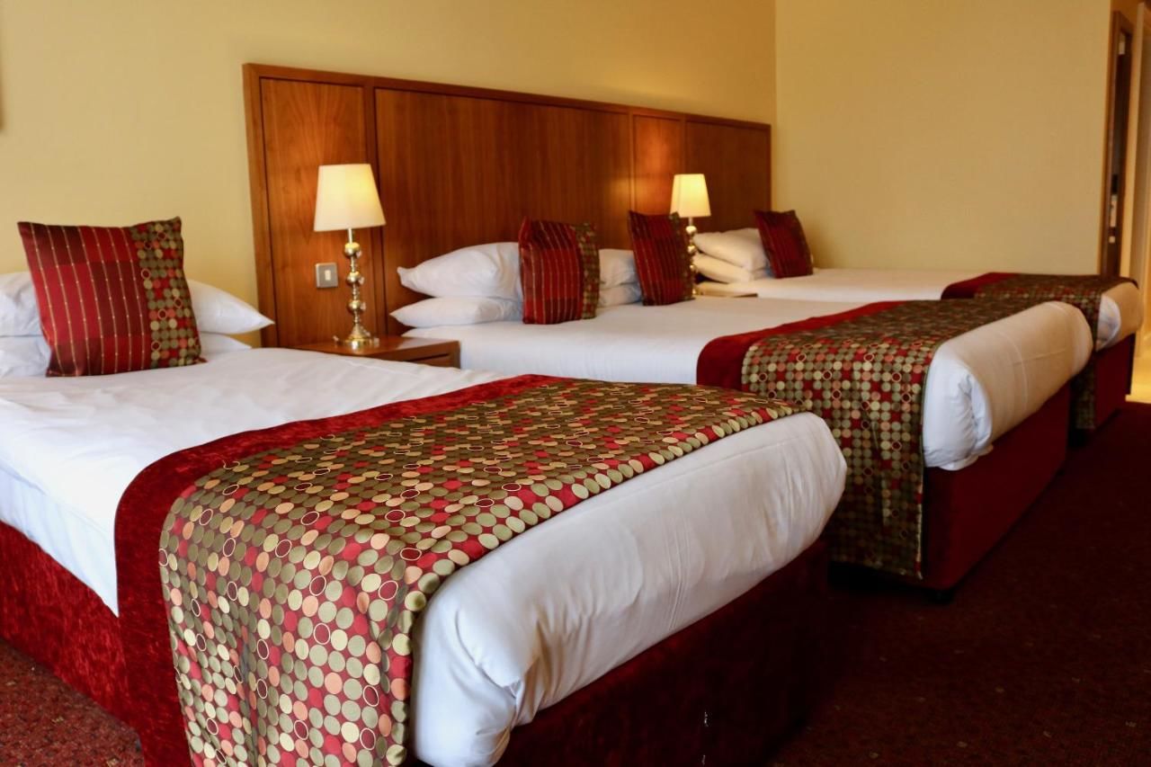 Отель The Rose Hotel Трали